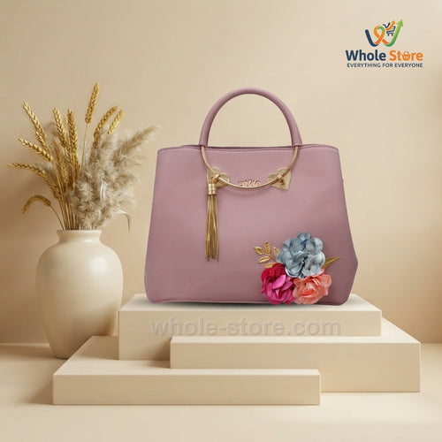 Dusty Rose Handbag with Floral Accents and Tassel